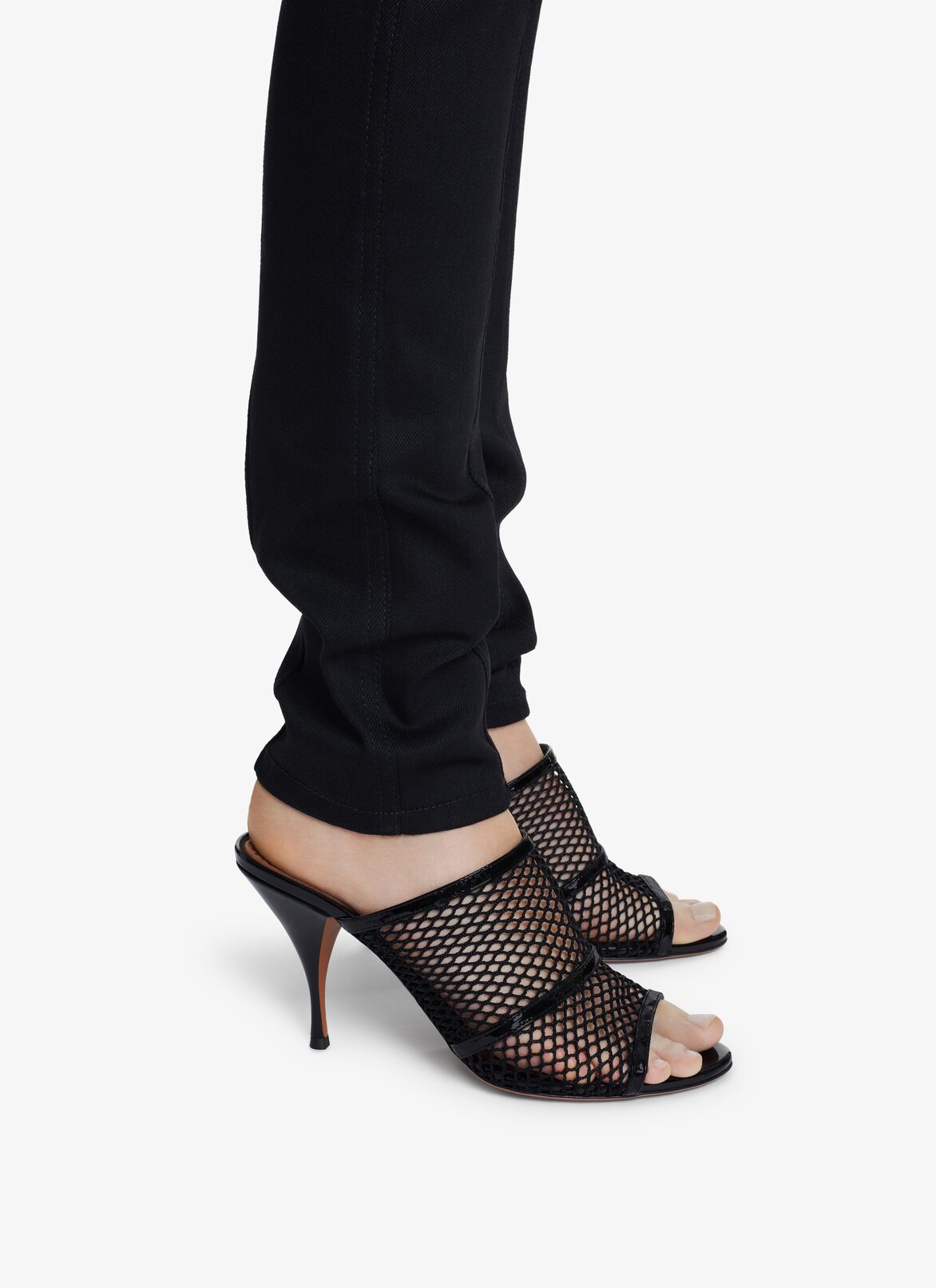 FISHNET HEEL MULES ALAÏA BLACK FISHNET HEEL MULES
